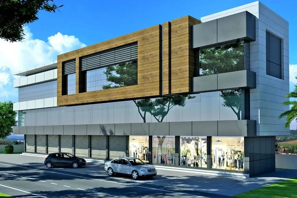 Commercial building with white, grey and wood-finish ACP cladding